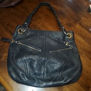 Makowsky black leather handbag.